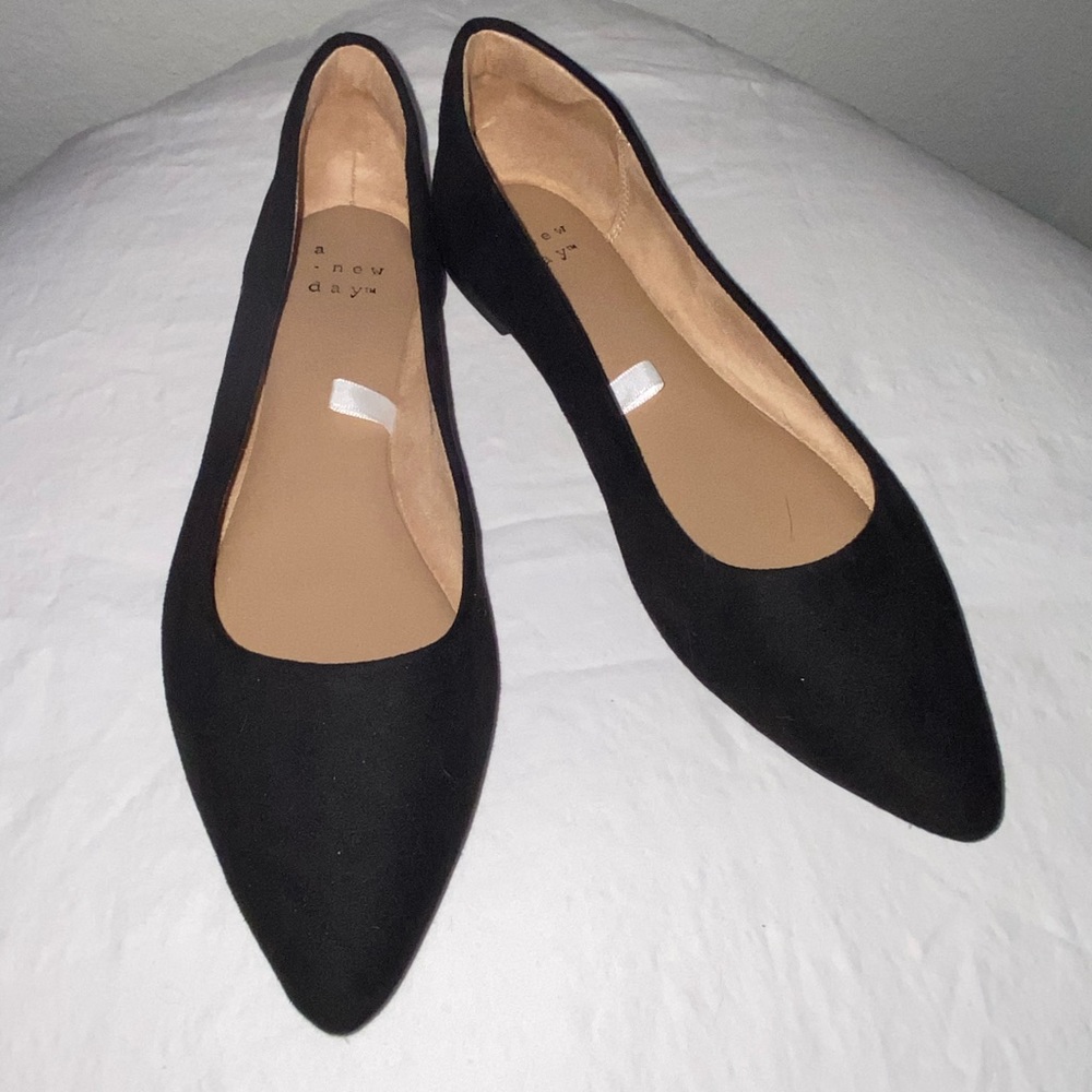 A New Day Flats